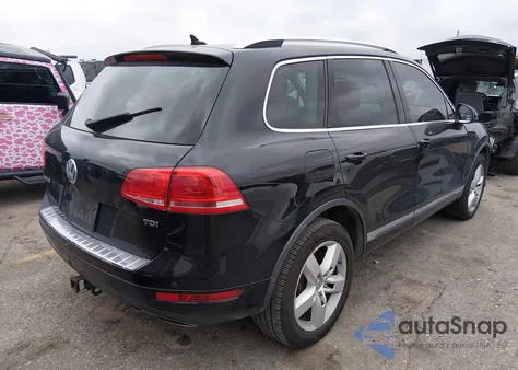 2012 Volkswagen Touareg Tdi Lux z USA, uszkodzony, nr VIN WVGFK9BP7CD004140